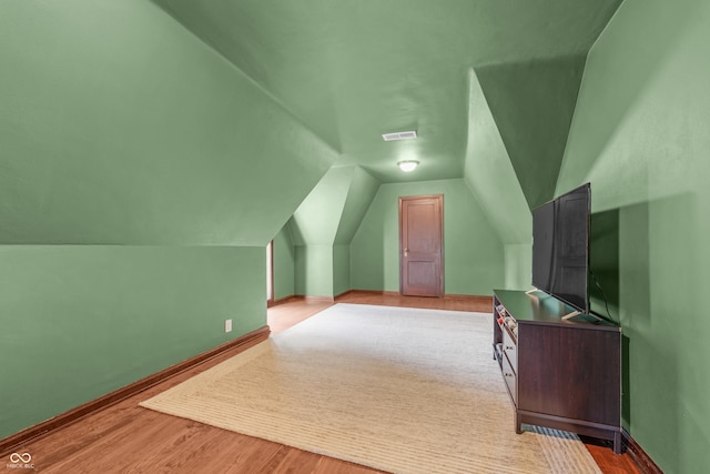 2421 W 39th St, Indianapolis, IN 46228 - additional living space featuring lofted ceiling and wood finished floors