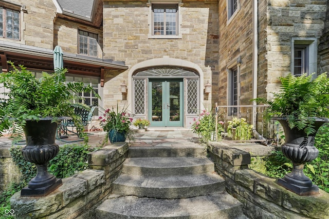 2421 W 39th St, Indianapolis, IN 46228 - view of exterior entry with french doors and stone siding