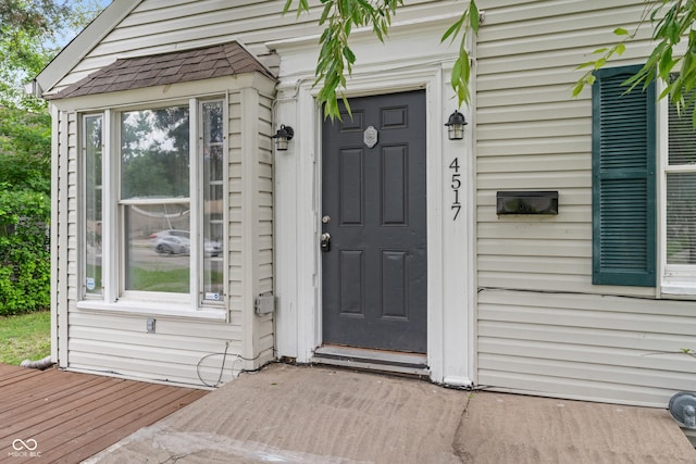4517 E 16th St, Indianapolis, IN 46201 - doorway to property with a shingled roof