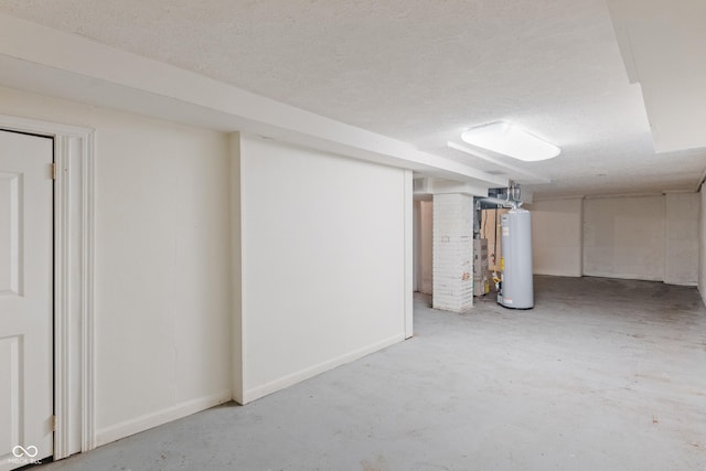 4517 E 16th St, Indianapolis, IN 46201 - finished below grade area featuring water heater and a textured ceiling