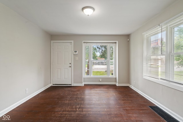 4517 E 16th St, Indianapolis, IN 46201 - entrance foyer featuring dark wood-style flooring and baseboards