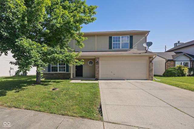 10222 Arapahoe Dr, Indianapolis, IN 46235 - view of front of home with driveway, a front yard, brick siding, and a garage