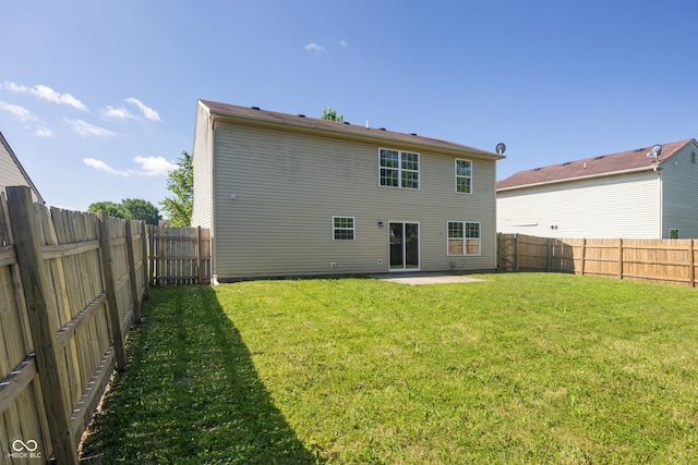 10222 Arapahoe Dr, Indianapolis, IN 46235 - rear view of property featuring a patio area and a fenced backyard