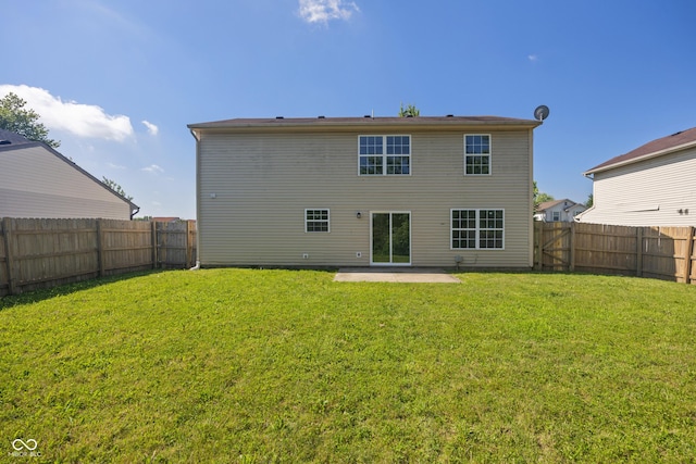 10222 Arapahoe Dr, Indianapolis, IN 46235 - back of property with a patio and a fenced backyard