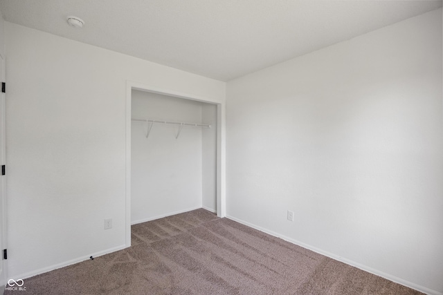 10222 Arapahoe Dr, Indianapolis, IN 46235 - unfurnished bedroom with carpet flooring and a closet