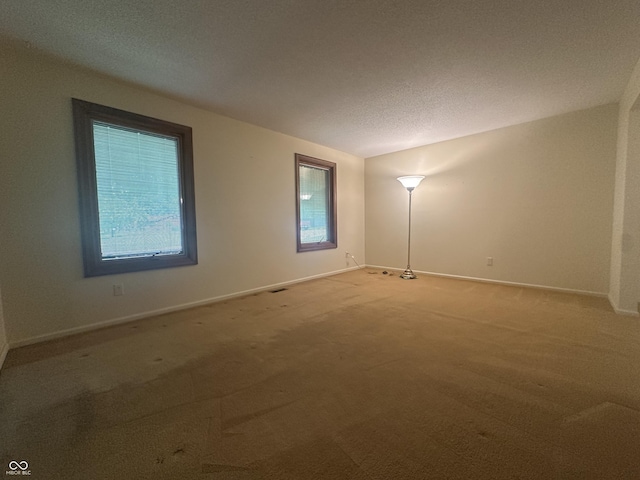 1289 Woodcreek Dr, Greenwood, IN 46142 - unfurnished room featuring light carpet and baseboards
