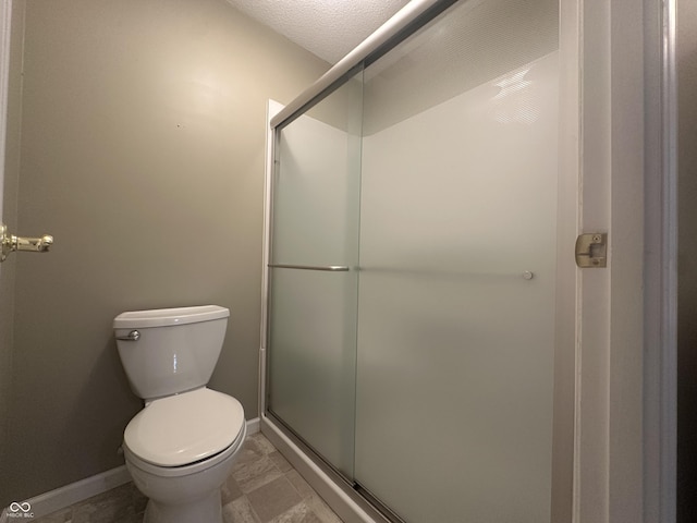 1289 Woodcreek Dr, Greenwood, IN 46142 - full bathroom featuring toilet and a shower with shower door