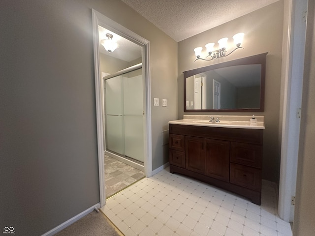 1289 Woodcreek Dr, Greenwood, IN 46142 - full bathroom with a stall shower, vanity, and a textured ceiling