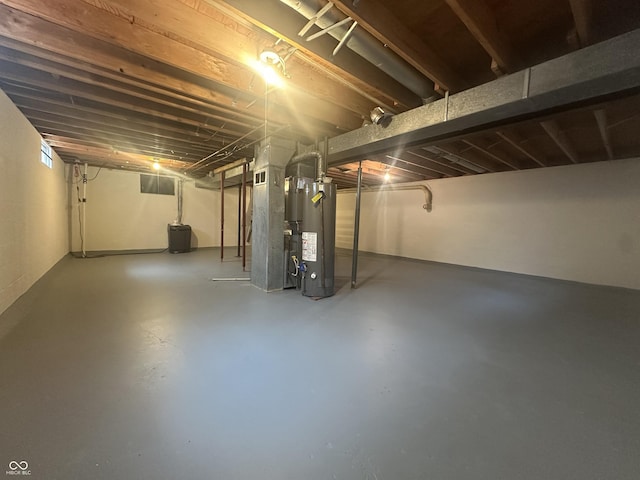 1289 Woodcreek Dr, Greenwood, IN 46142 - unfinished below grade area featuring gas water heater