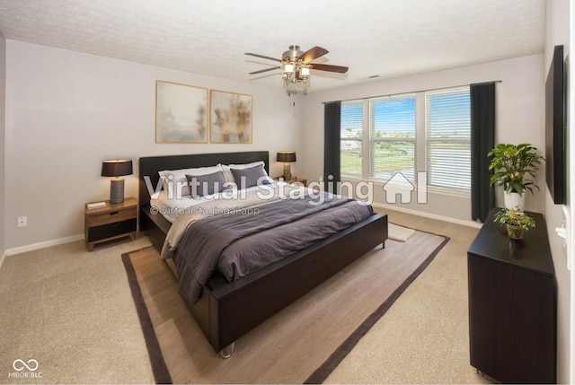 14052 Rayners Ln, Fishers, IN 46037 - bedroom featuring light carpet, a textured ceiling, and ceiling fan