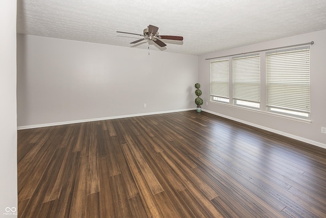 14052 Rayners Ln, Fishers, IN 46037 - unfurnished room with a textured ceiling, a ceiling fan, and dark wood finished floors