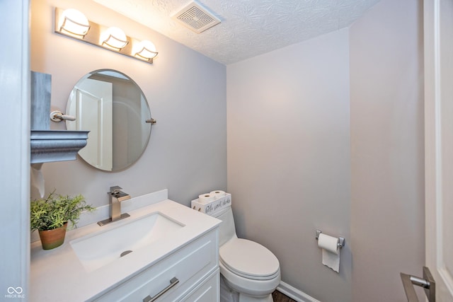 14052 Rayners Ln, Fishers, IN 46037 - half bath with vanity and a textured ceiling