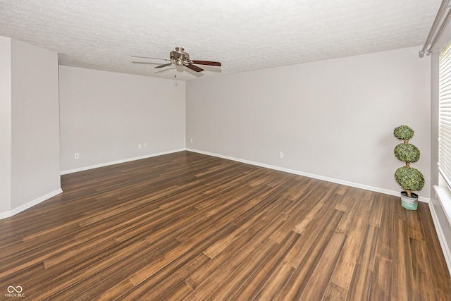 14052 Rayners Ln, Fishers, IN 46037 - spare room featuring ceiling fan, dark wood finished floors, and a textured ceiling