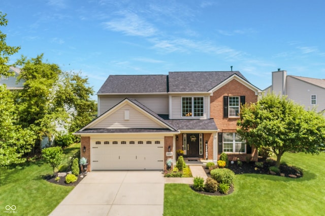 14052 Rayners Ln, Fishers, IN 46037 - traditional-style house featuring driveway, a front yard, brick siding, and an attached garage
