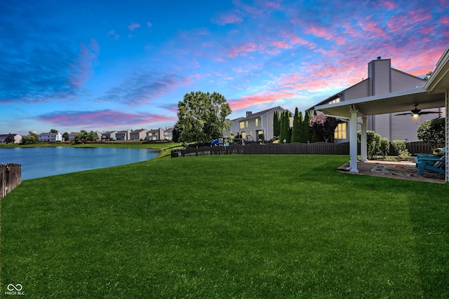 14052 Rayners Ln, Fishers, IN 46037 - view of yard featuring ceiling fan, a water view, a patio, and a residential view