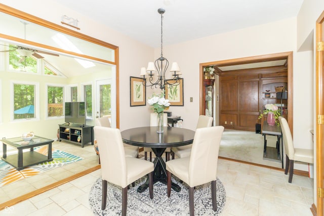 10518 Courageous Dr, Indianapolis, IN 46236 - dining area featuring a chandelier, lofted ceiling, and a ceiling fan