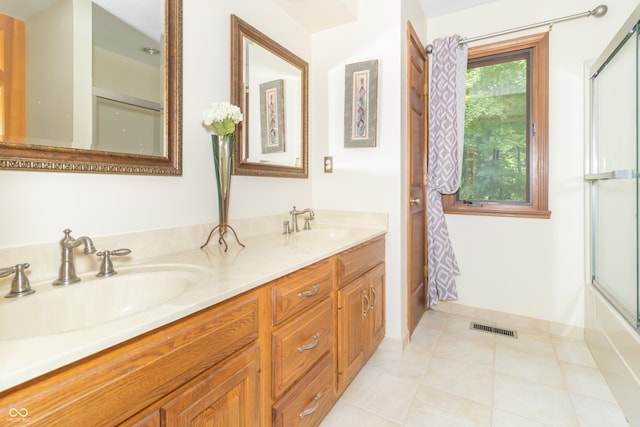 10518 Courageous Dr, Indianapolis, IN 46236 - full bathroom featuring double vanity and tile patterned flooring