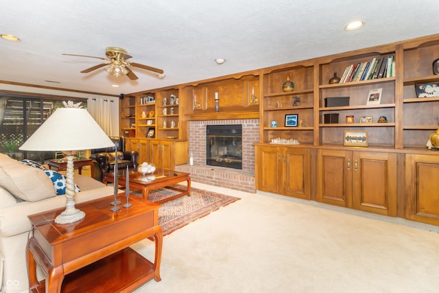 10518 Courageous Dr, Indianapolis, IN 46236 - living room with ceiling fan, recessed lighting, a fireplace, and light colored carpet