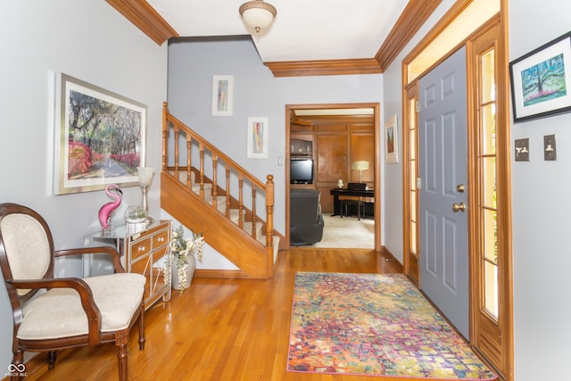 10518 Courageous Dr, Indianapolis, IN 46236 - entryway with crown molding, wood finished floors, and stairway
