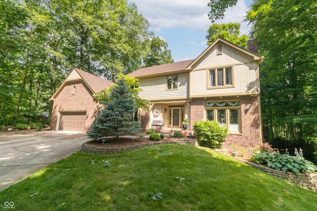 10518 Courageous Dr, Indianapolis, IN 46236 - view of front of home featuring brick siding, a chimney, a garage, concrete driveway, and a front lawn