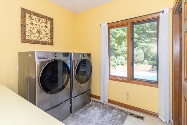 10518 Courageous Dr, Indianapolis, IN 46236 - washroom with independent washer and dryer and baseboards