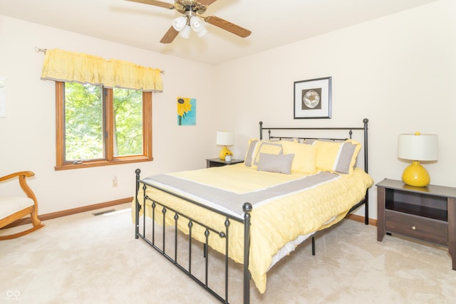 10518 Courageous Dr, Indianapolis, IN 46236 - carpeted bedroom with baseboards and a ceiling fan