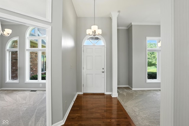 6183 Whitetail Run, Greenwood, IN 46143 - carpeted foyer entrance with a chandelier and wood finished floors