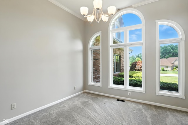 6183 Whitetail Run, Greenwood, IN 46143 - carpeted empty room featuring a chandelier and ornamental molding