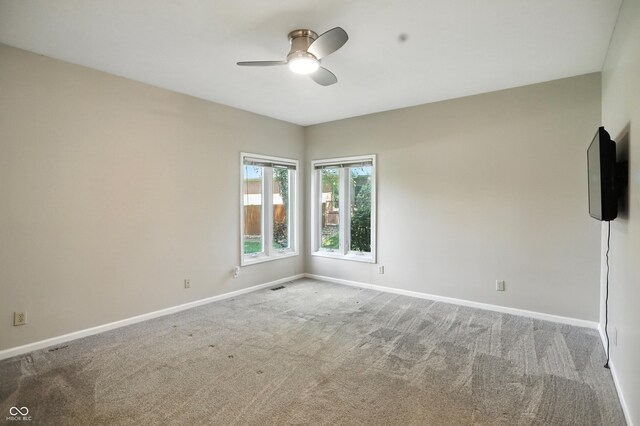 6183 Whitetail Run, Greenwood, IN 46143 - carpeted empty room with a ceiling fan and baseboards