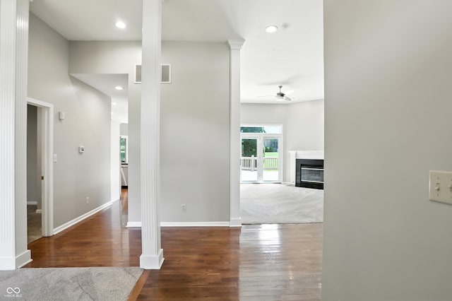 6183 Whitetail Run, Greenwood, IN 46143 - hallway featuring ornate columns, wood finished floors, and recessed lighting