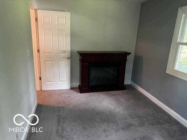 3815 Briar Rdg, Monrovia, IN 46157 - unfurnished living room with carpet and a fireplace