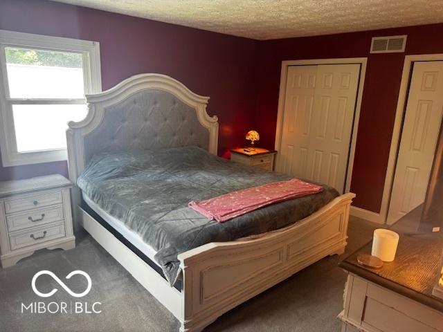 3815 Briar Rdg, Monrovia, IN 46157 - carpeted bedroom featuring a textured ceiling