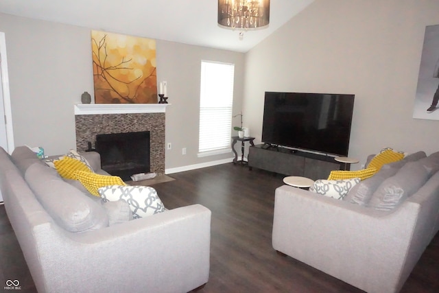 6422 Hollingsworth Dr, Indianapolis, IN 46268 - living room with wood finished floors, vaulted ceiling, and a fireplace