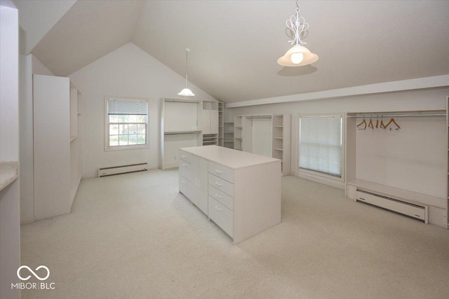 8315 Union Chapel Rd, Indianapolis, IN 46240 - spacious closet featuring a baseboard radiator, lofted ceiling, and light carpet
