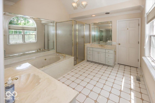 8315 Union Chapel Rd, Indianapolis, IN 46240 - bathroom with vanity, a garden tub, tile patterned floors, a stall shower, and ornamental molding
