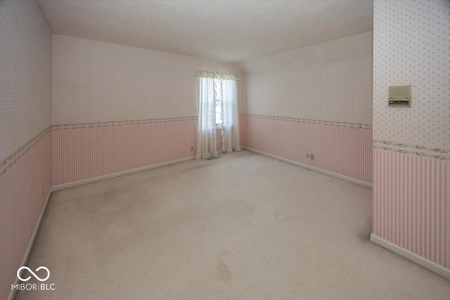 8315 Union Chapel Rd, Indianapolis, IN 46240 - carpeted spare room with wallpapered walls
