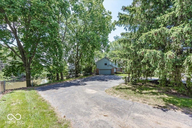 8315 Union Chapel Rd, Indianapolis, IN 46240 - obstructed view of property with driveway