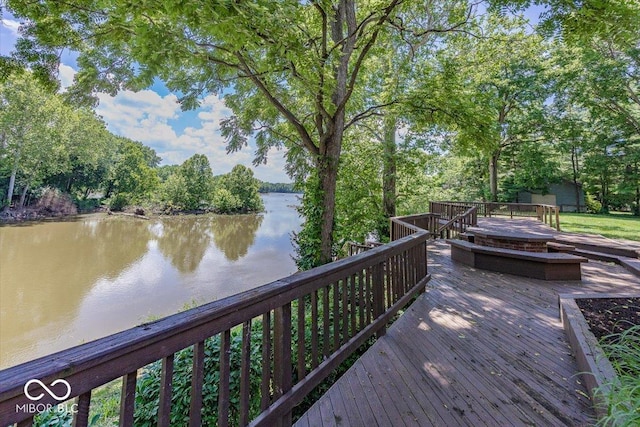 8315 Union Chapel Rd, Indianapolis, IN 46240 - deck featuring a water view and view of scattered trees
