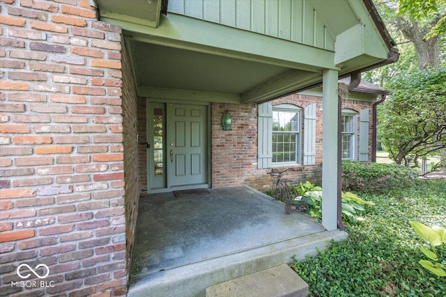 8315 Union Chapel Rd, Indianapolis, IN 46240 - view of exterior entry featuring brick siding and board and batten siding