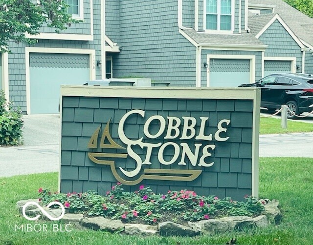 4609 Framington Ct, Indianapolis, IN 46254 - community sign featuring a garage