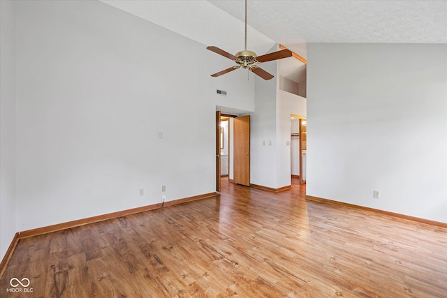 4609 Framington Ct, Indianapolis, IN 46254 - spare room featuring ceiling fan, light wood-style floors, and high vaulted ceiling