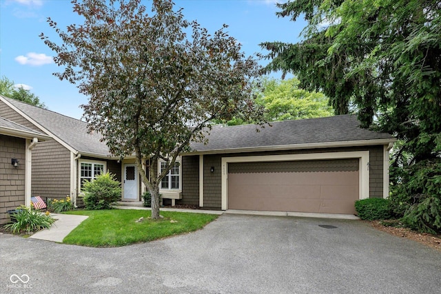 4609 Framington Ct, Indianapolis, IN 46254 - single story home featuring asphalt driveway, an attached garage, and roof with shingles