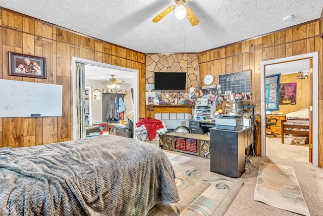 850 Duane St, Franklin, IN 46131 - carpeted bedroom featuring wood walls, a textured ceiling, a ceiling fan, and ornamental molding
