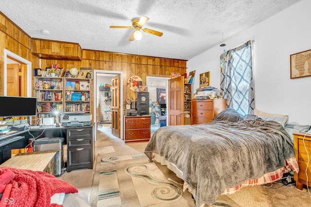 850 Duane St, Franklin, IN 46131 - bedroom with wood walls, an office area, a textured ceiling, light colored carpet, and ceiling fan