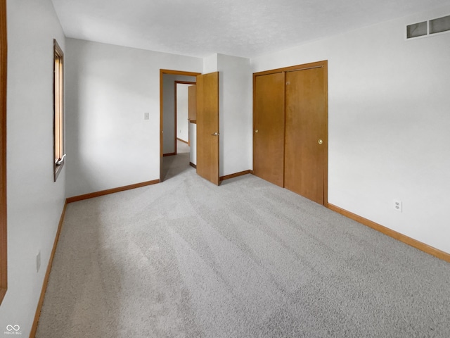 757 Winter Way, Carmel, IN 46032 - unfurnished bedroom featuring light colored carpet and a closet