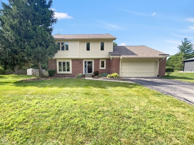 757 Winter Way, Carmel, IN 46032 - colonial-style house featuring a garage, brick siding, and driveway