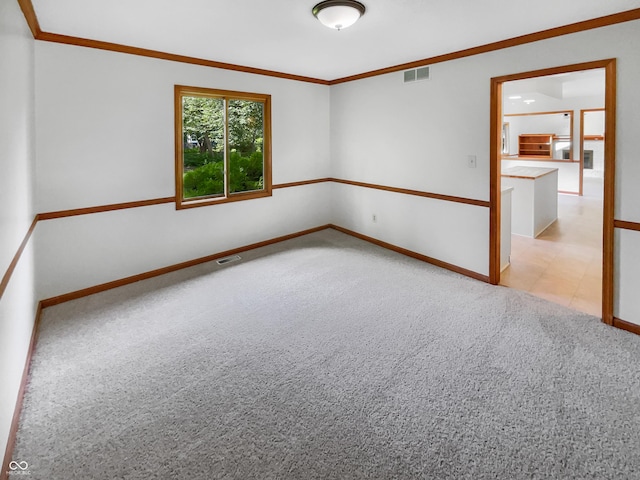 757 Winter Way, Carmel, IN 46032 - spare room featuring light carpet and ornamental molding