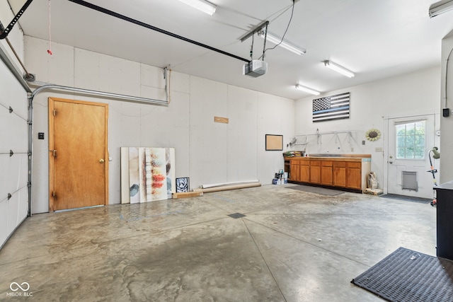 4465 W Woodbridge Ln, New Palestine, IN 46163 - garage featuring a garage door opener