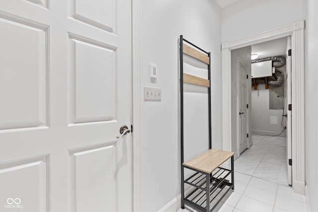 4465 W Woodbridge Ln, New Palestine, IN 46163 - hall with light marble finish flooring and baseboards