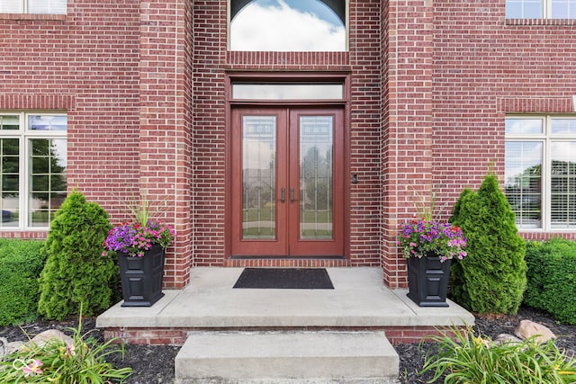 4465 W Woodbridge Ln, New Palestine, IN 46163 - property entrance with french doors and brick siding